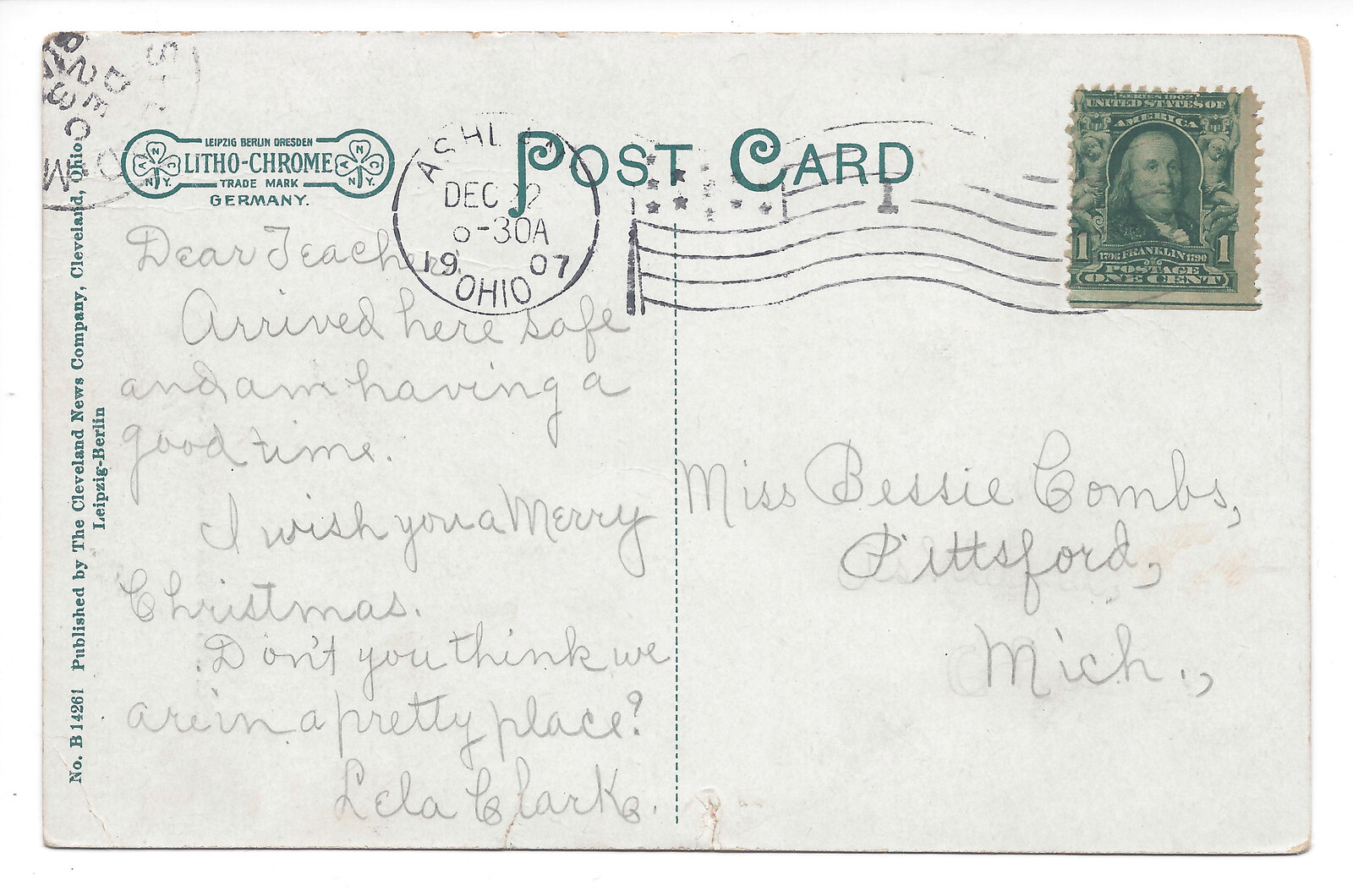 Reverse of the postcard with a handwritten Christmas greeting, teacher’s name, publisher’s mark, stamp and Ashland cancellation.